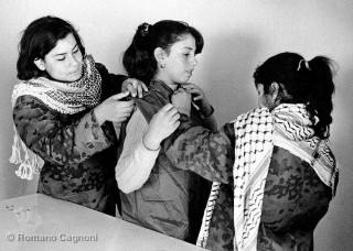 Jordan, 1970. Palestinian girls in Amman trying some hand sewn m